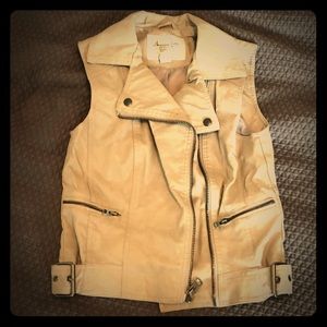 Sleeveless tan vest